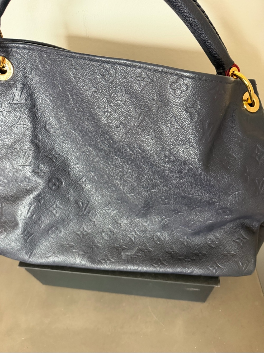 Louis Vuitton Navy Monogram Embossed Artsy Bag with Gold Hardware.